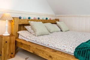 Postel nebo postele na pokoji v ubytování Domek na Kaszubach 21-2 - Ostoja Bukowo