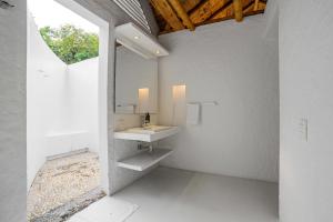 Ένα μπάνιο στο Entremonte Wellness Hotel and Spa