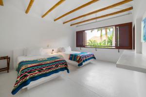 Ένα ή περισσότερα κρεβάτια σε δωμάτιο στο Entremonte Wellness Hotel and Spa