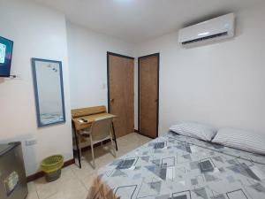 TV a/nebo společenská místnost v ubytování Confortable y Central Habitación a una cuadra de la Playa 10A + 11 fotografií