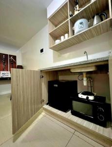 Köök või kööginurk majutusasutuses Gorgeous 2BR Condo unit with free WiFi