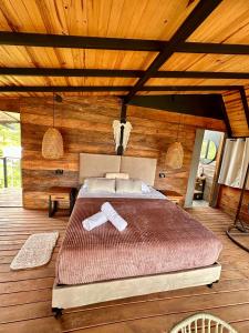 Postel nebo postele na pokoji v ubytování Ecoedén glamping + 34 fotografií