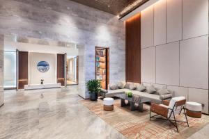 Posezení v ubytování IntercityHotel Jingdezhen Taoxichuan