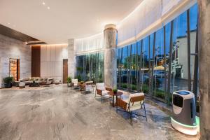 Posezení v ubytování IntercityHotel Jingdezhen Taoxichuan