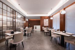 Posezení v ubytování IntercityHotel Jingdezhen Taoxichuan