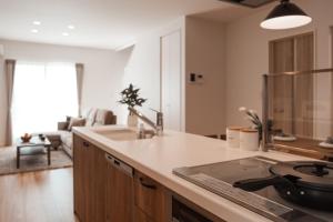 a kitchen with a sink and a stove top oven at Mova Villa Haramizu in Kikuchi +117 photos