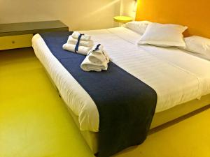 Posteľ alebo postele v izbe v ubytovaní Correra 241 Lifestyle Hotel