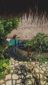 Amnaya Resort Nusa Dua外面的花园