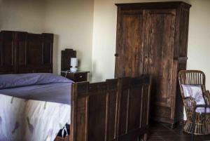 Łóżko lub łóżka w pokoju w obiekcie Azienda Agrituristica Alcastlè
