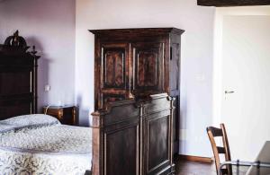 Łóżko lub łóżka w pokoju w obiekcie Azienda Agrituristica Alcastlè