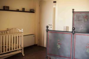 Łóżko lub łóżka w pokoju w obiekcie Azienda Agrituristica Alcastlè