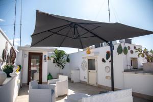 A patio or other outdoor area at Dimora Asmara 11 15