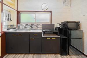 Eldhús eða eldhúskrókur á nest Olive Atami