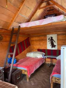 Postel nebo postele na pokoji v ubytování Eko Kamp Garcevic