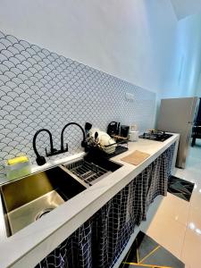 アロースターにあるRumaKita Alor Setar Paddy View Netflix M0slim Onlyのギャラリーの写真