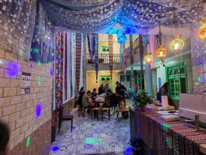 Restavracija oz. druge možnosti za prehrano v nastanitvi 喀什故人归国际青年旅舍 Kashgar Returning Friends International Youth Hostel