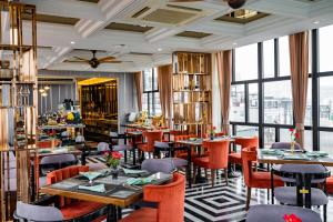 Restoran või mõni muu söögikoht majutusasutuses Minerva Premium Hotel