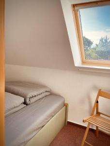 Postel nebo postele na pokoji v ubytování Fewo Sonnengelb - Fulgenhaus