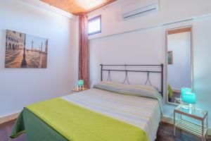 Posteľ alebo postele v izbe v ubytovaní Villa piscina a due passi dal mare