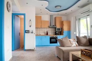 Kuchyň nebo kuchyňský kout v ubytování D&G Azure Greens Apartment