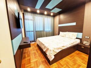 Postel nebo postele na pokoji v ubytování Central Apartment - Spacious designer property in Stara Zagora