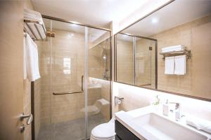 Koupelna v ubytování Yashi International Aparthotel