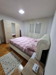 Postel nebo postele na pokoji v ubytování Apartment Vuk