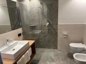 Koupelna v ubytování Residence Terentis + 37 fotografií