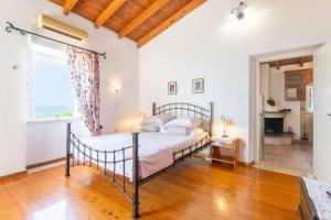 Postel nebo postele na pokoji v ubytování Oldstone cottage + 18 fotografií