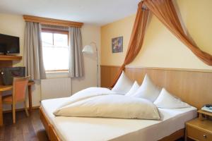 Postel nebo postele na pokoji v ubytování Relax & Vitalhotel Adler