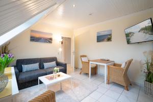 Khu vực ghế ngồi tại HER16d Ankes Gästehaus F