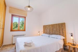 Postel nebo postele na pokoji v ubytování Ca's Pastor - Chalet de montaña
