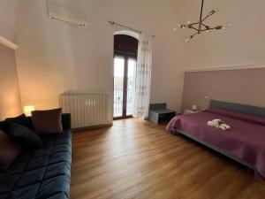 Postel nebo postele na pokoji v ubytování Casa Al Muretto