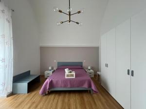 Postel nebo postele na pokoji v ubytování Casa Al Muretto