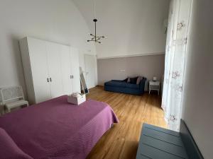 Postel nebo postele na pokoji v ubytování Casa Al Muretto