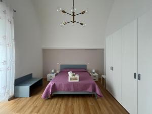 Postel nebo postele na pokoji v ubytování Casa Al Muretto