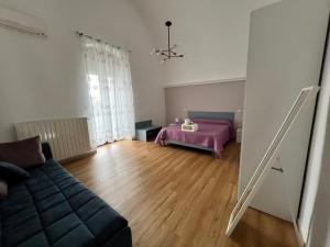 Postel nebo postele na pokoji v ubytování Casa Al Muretto
