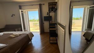 TV a/nebo společenská místnost v ubytování Itanco Resort