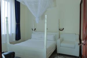 Katil atau katil-katil dalam bilik di Mowicribs Hotel and Spa