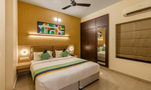 Ένα ή περισσότερα κρεβάτια σε δωμάτιο στο Treebo Nestlay Rooms, Nungambakkam