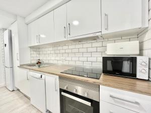 Kuchyňa alebo kuchynka v ubytovaní Apartamento 3 dormitorios centro Villajoyosa