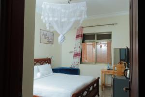 Katil atau katil-katil dalam bilik di Mowicribs Hotel and Spa