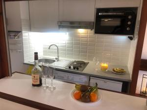 Η κουζίνα ή μικρή κουζίνα στο Appartement idéalement situé