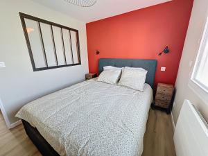 En eller flere senge i et værelse på Sky & sea