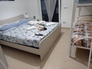 Postel nebo postele na pokoji v ubytování B&B IL TEMPONE