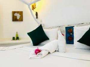 Postel nebo postele na pokoji v ubytování Dream Luxury B&b Watamu