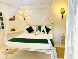 Postel nebo postele na pokoji v ubytování Dream Luxury B&b Watamu