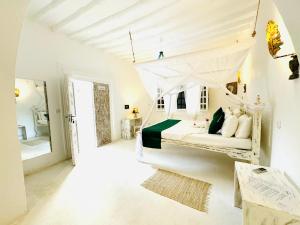 Postel nebo postele na pokoji v ubytování Dream Luxury B&b Watamu