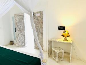 Postel nebo postele na pokoji v ubytování Dream Luxury B&b Watamu