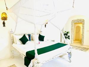 Postel nebo postele na pokoji v ubytování Dream Luxury B&b Watamu
